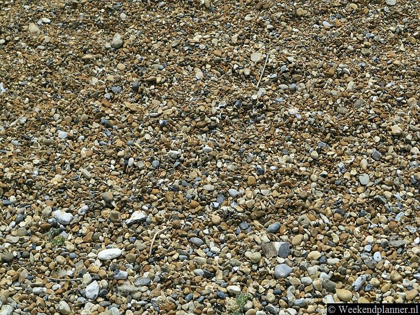 De kiezels op de stranden van Eastbourne zijn niet scherp.Tip: Vakantie aan  de kust van Zuid-Engeland.